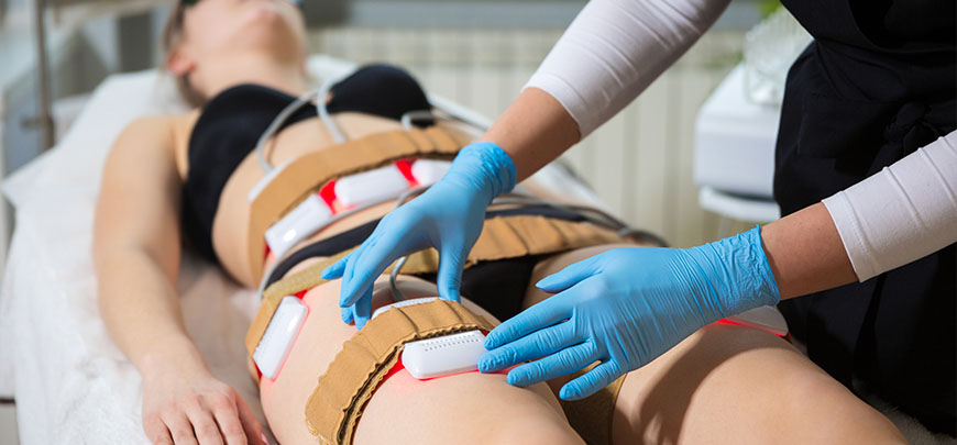 Patient receiving Red Light Therapy in Cupertino for pain relief